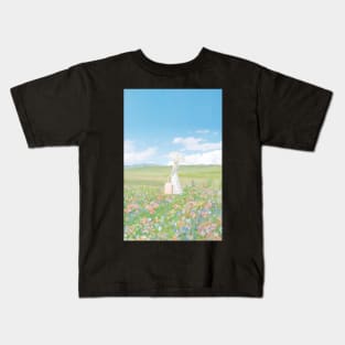 woman in a flower field with umbrella and suitcase Kids T-Shirt